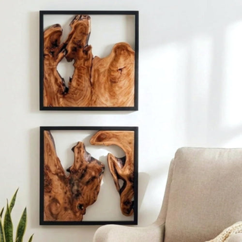 Design reference: Two cedar wood wall sculptures in black frames, styled vertically.
