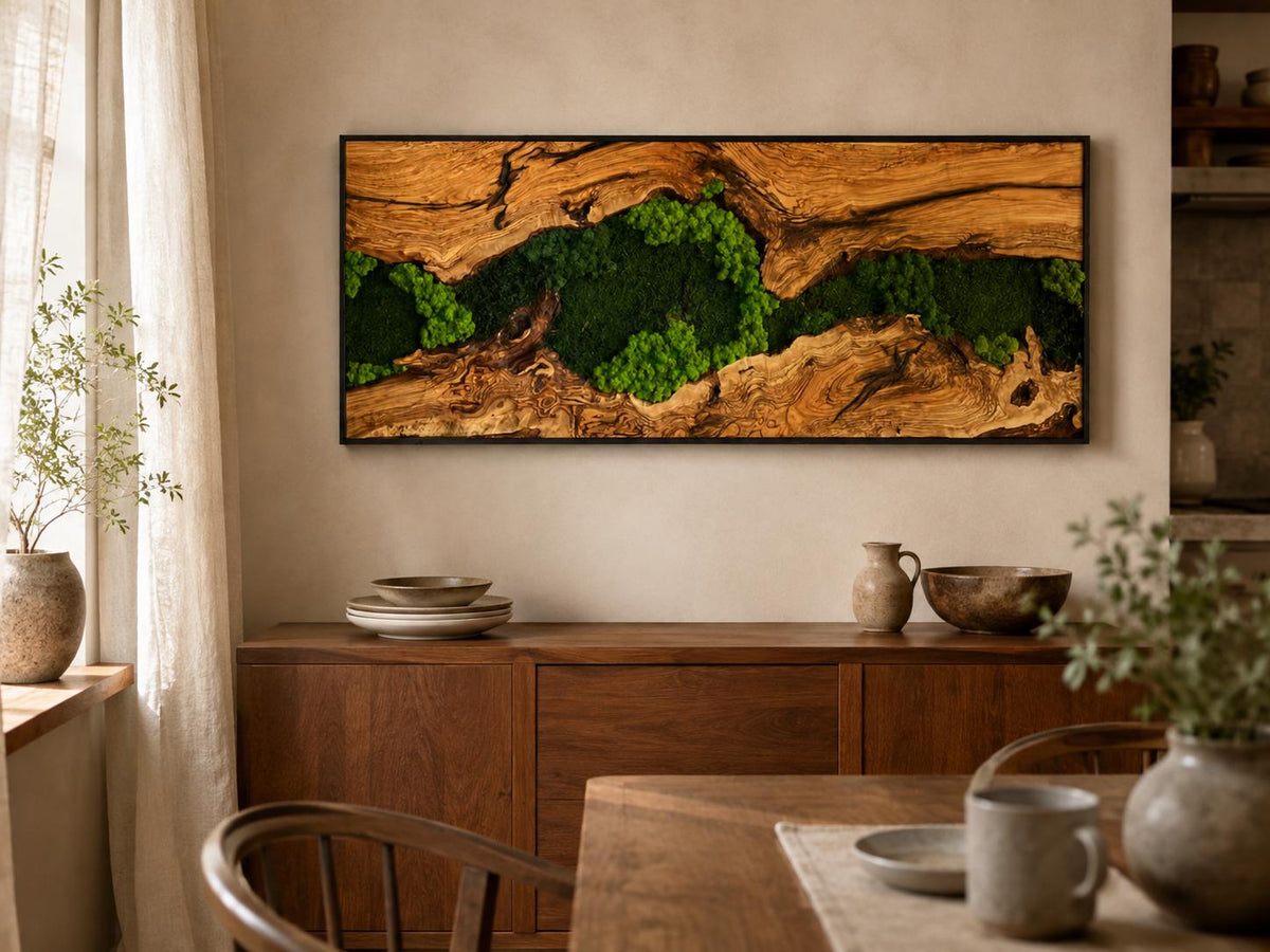 A rectangular wall art piece featuring a natural wood frame with a central horizontal gap filled with vibrant green preserved moss. The wood displays a rich, textured grain pattern with deep brown tones and organic, weathered edges.