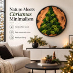 A circular wall art piece featuring a natural wood slice frame with a green preserved moss arrangement shaped like a Christmas tree. The text reads Nature Meets Christmas Minimalism, Handcrafted wood, Real preserved moss, Ready to hang.