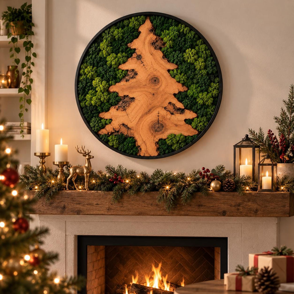 A circular wall art piece featuring a natural wood slice shaped like a pine tree, surrounded by vibrant green preserved moss within a thin black frame. The wood displays visible grain, knots, and organic edges against the moss.