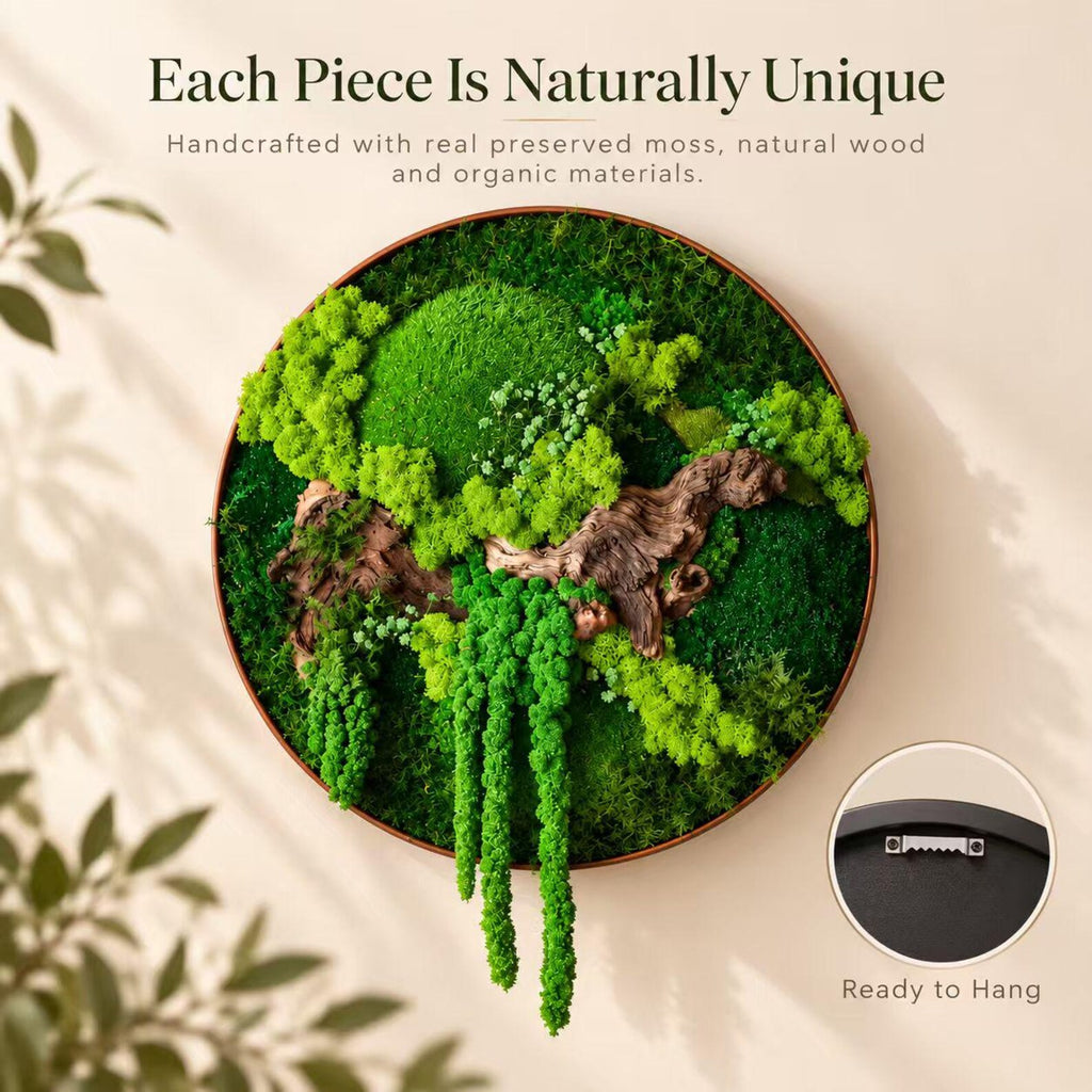 A circular wall art piece featuring preserved green moss and natural wood elements within a round frame. The text reads: Each Piece Is Naturally Unique. Handcrafted with real preserved moss, natural wood and organic materials. Ready to Hang.
