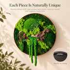 A circular wall art piece featuring preserved green moss and natural wood elements within a round frame. The text reads: Each Piece Is Naturally Unique. Handcrafted with real preserved moss, natural wood and organic materials. Ready to Hang.