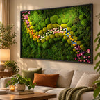 A rectangular wall art piece featuring a dense arrangement of preserved green moss in various shades and textures, accented by a winding, S-shaped path of small, colorful flowers in shades of pink, yellow, white, and blue.