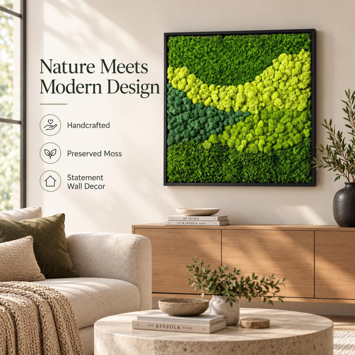 A square wall art piece featuring preserved moss in various shades of green, framed in black. Text on the wall reads: Nature Meets Modern Design, Handcrafted, Preserved Moss, and Statement Wall Decor. The moss creates a textured landscape.