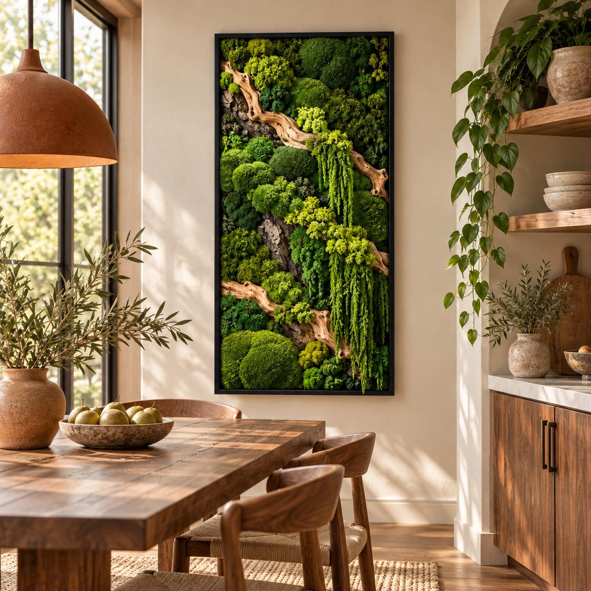A rectangular wall art piece featuring a dense arrangement of preserved green mosses and light-colored driftwood branches encased in a thin black frame, displaying various textures and shades of vibrant forest and lime green foliage.