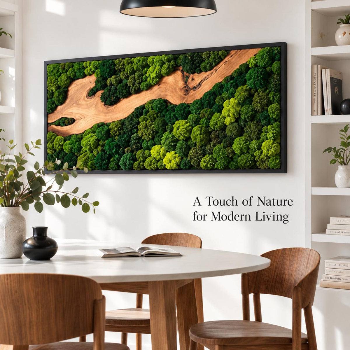 A rectangular wall art piece featuring preserved green moss and a central light brown wood grain element, framed in black. The text "A Touch of Nature for Modern Living" is printed on the wall below the artwork in black lettering.