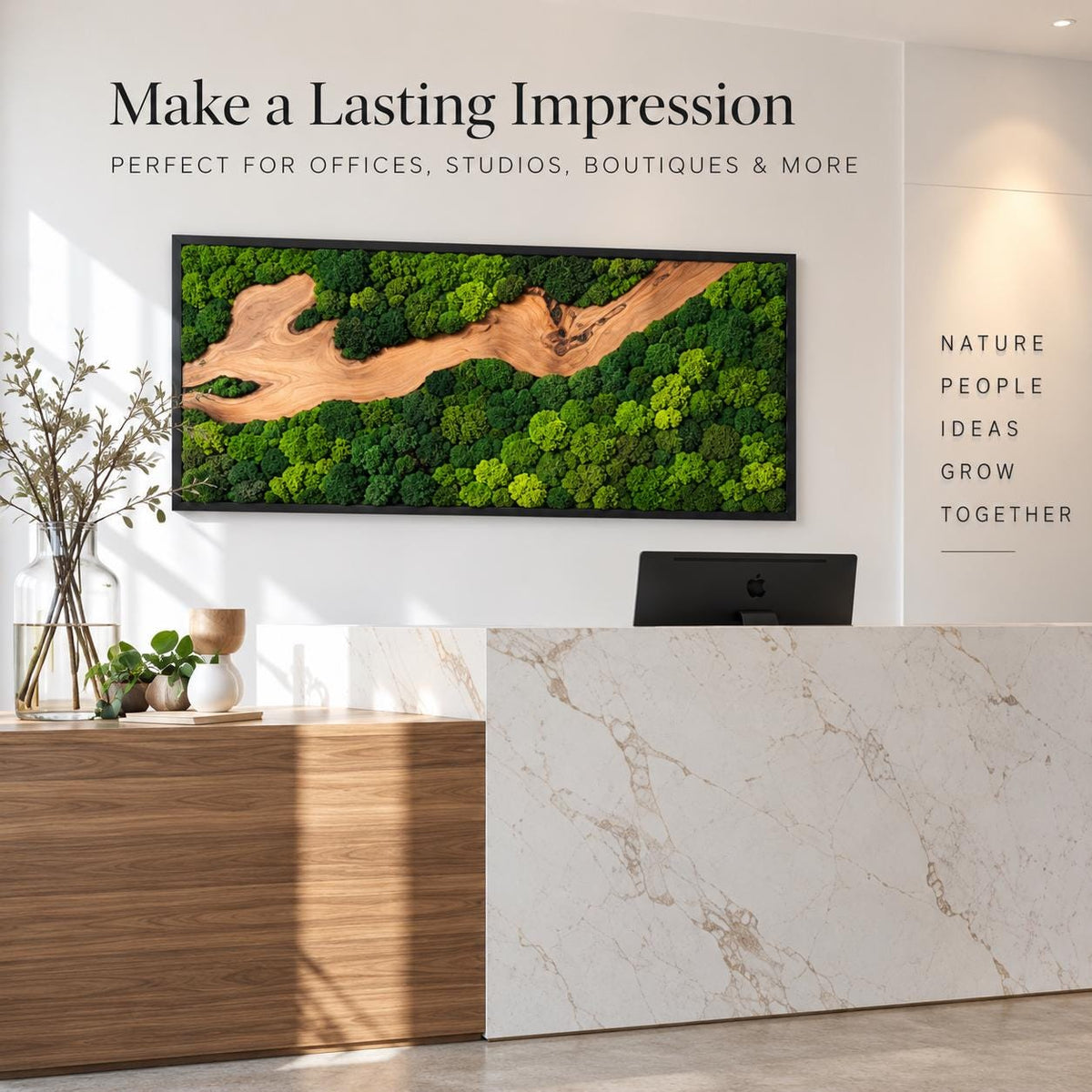 A rectangular wall art piece featuring preserved green moss and a central natural wood grain element in a black frame. The wall displays the text: Make a Lasting Impression, PERFECT FOR OFFICES, STUDIOS, BOUTIQUES & MORE, NATURE PEOPLE IDEAS GROW TOGETHER.